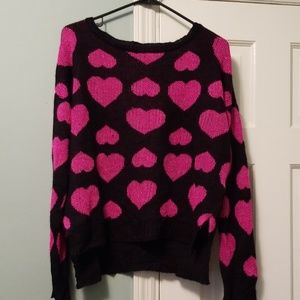 Pink and black sweater longer hem in back